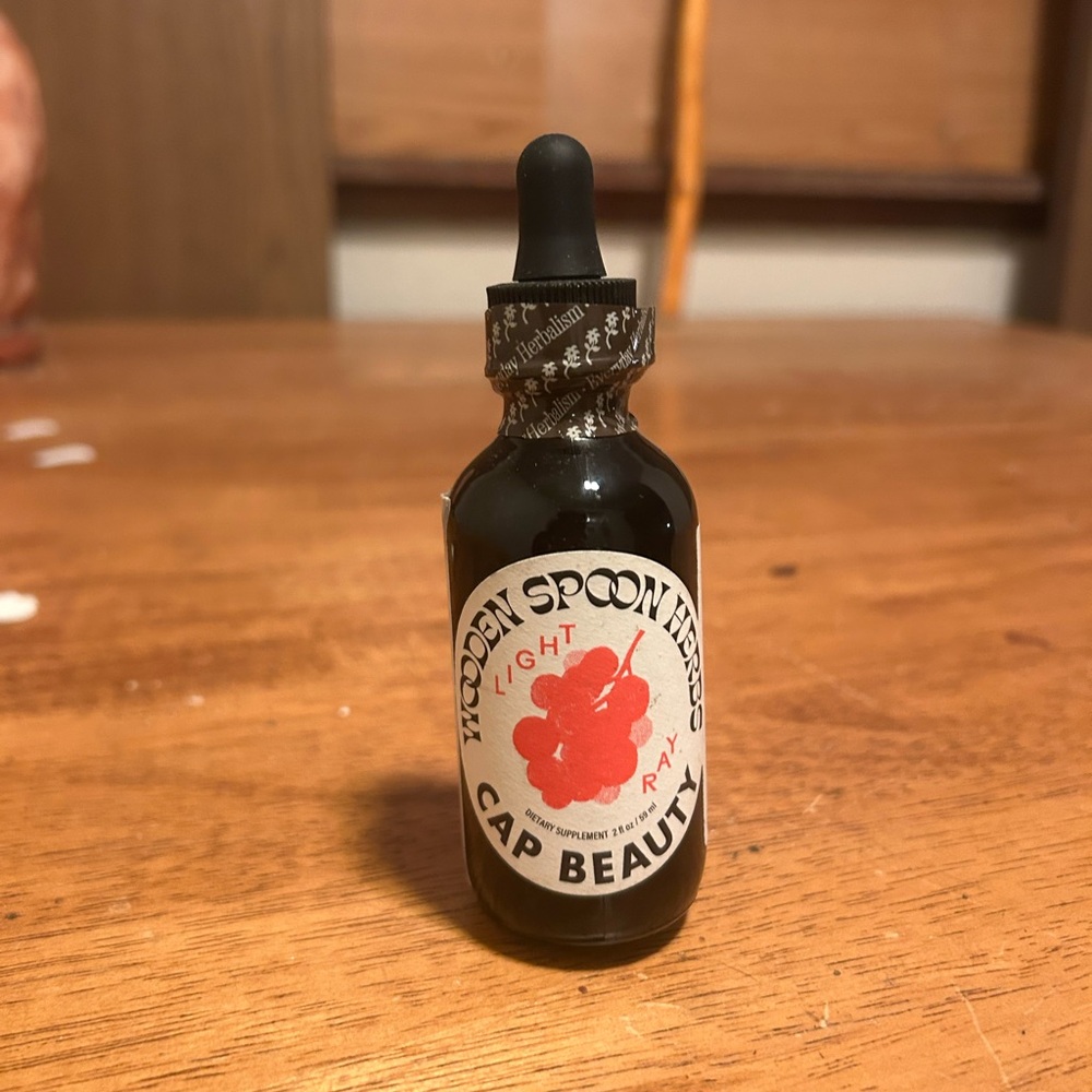 Wooden spoon herbs cap beauty skin care serum